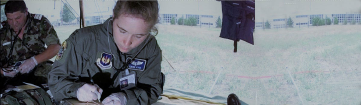 A woman in an air force uniform looking out of the window.